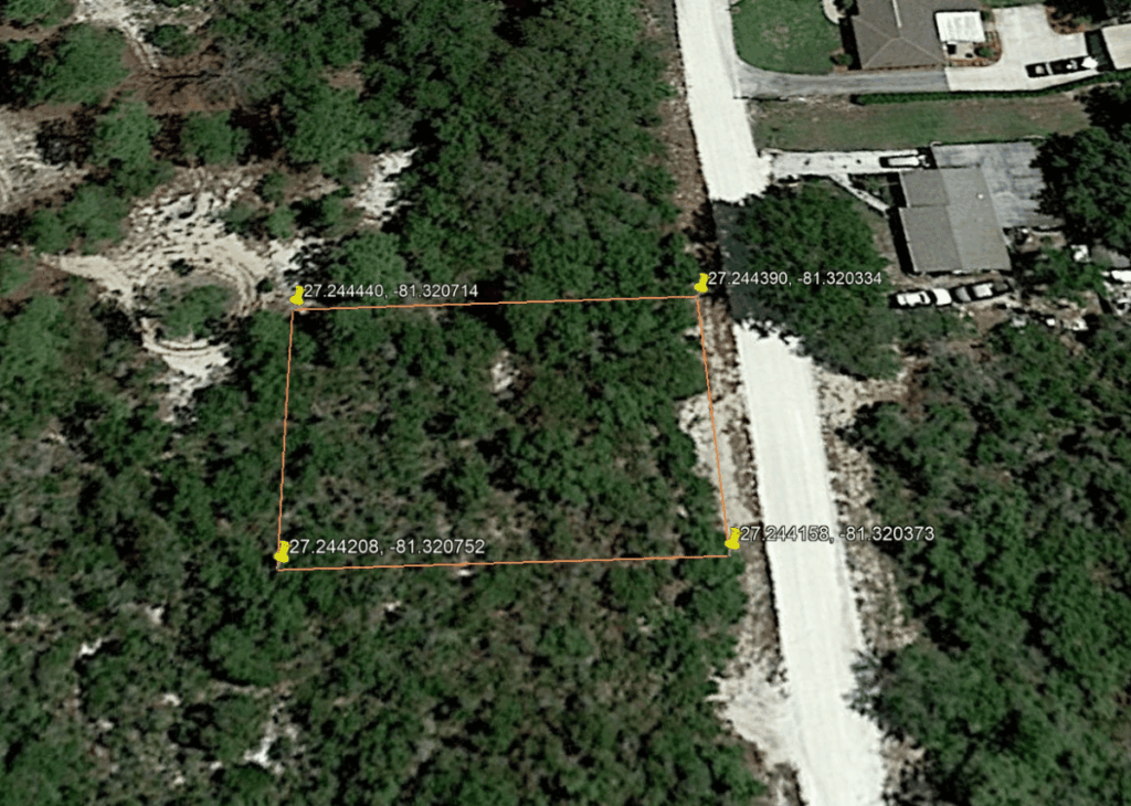 Aerial view of a rectangular wooded plot outlined in orange with GPS corner labels (27.244440, -81.320714 etc.) near a road and houses nearby.